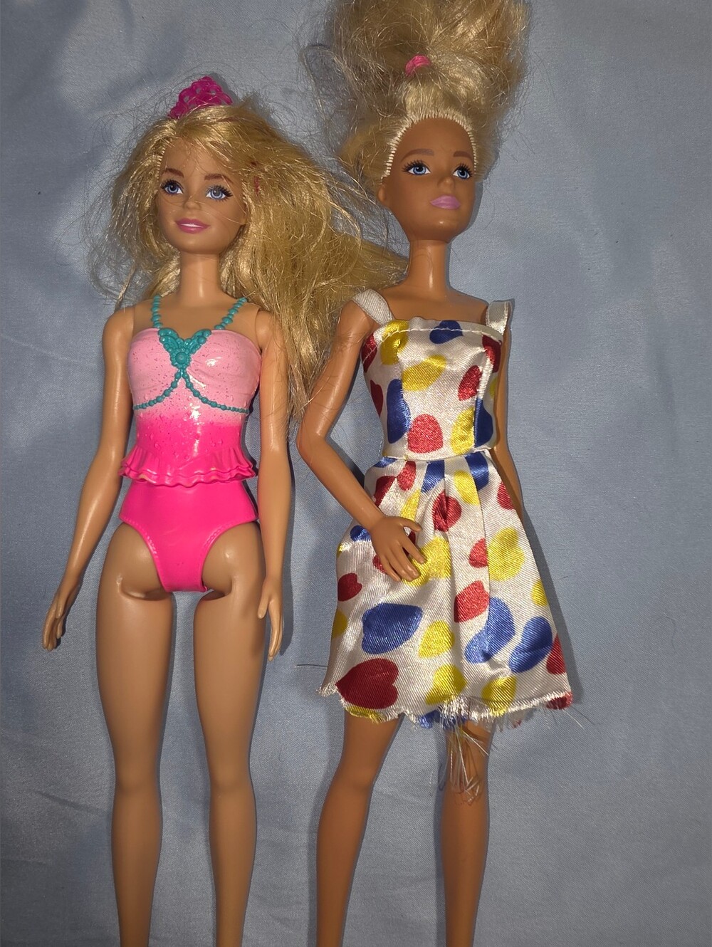 2 Barbie Dolls
